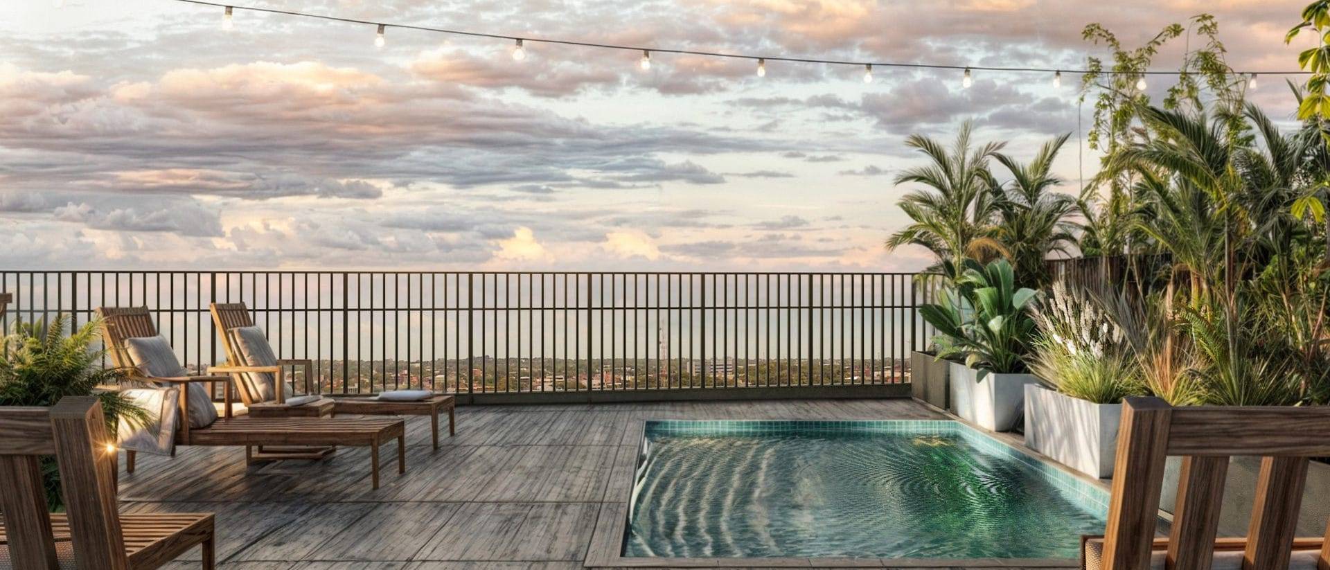 Rooftop pool at Vivo Villa Aurelia at sunset