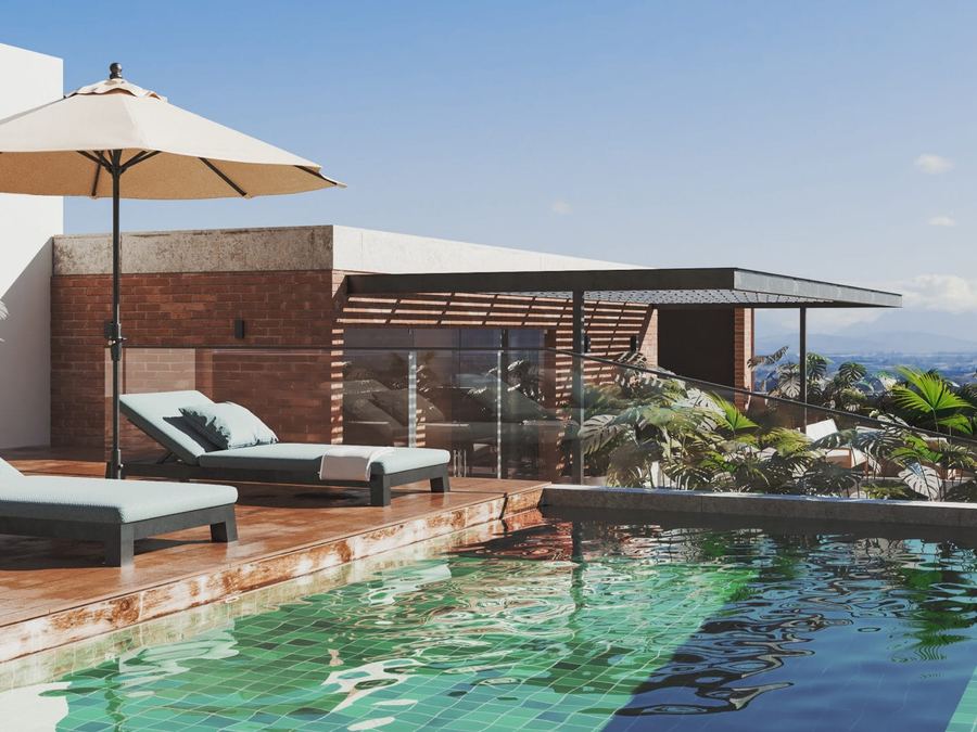 Rooftop pool with solarium at Paseo Boquerón