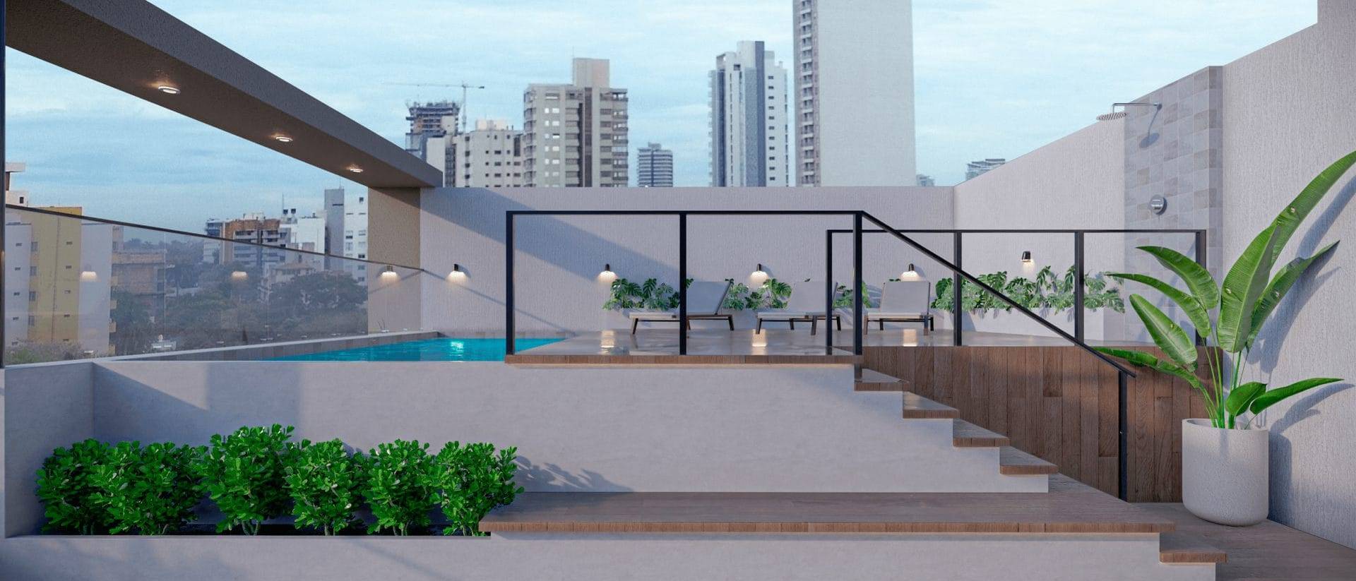 Terraço com piscina do Vivo Las Lomas e a cidade ao fundo